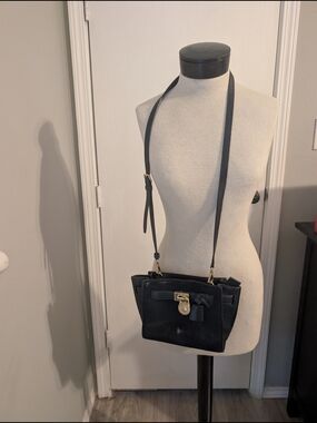 Michael Kors Black Crossbody with Gold Lock and Bow Accent